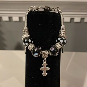 Black and white bead bracelet with silver accents